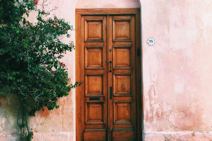 Vintage design wooden front door.