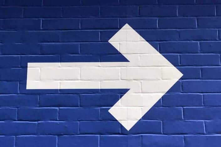 A wall-painted arrow pointing the right.