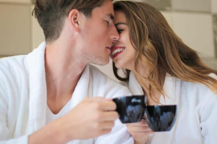 happy couple enjoying cup of coffee